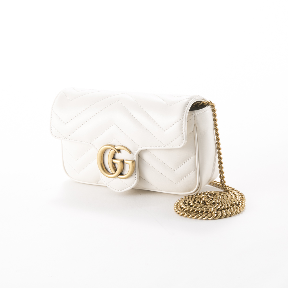 Shop GUCCI GG Marmont GG Marmont matelassé mini bag (474575) by Eretico